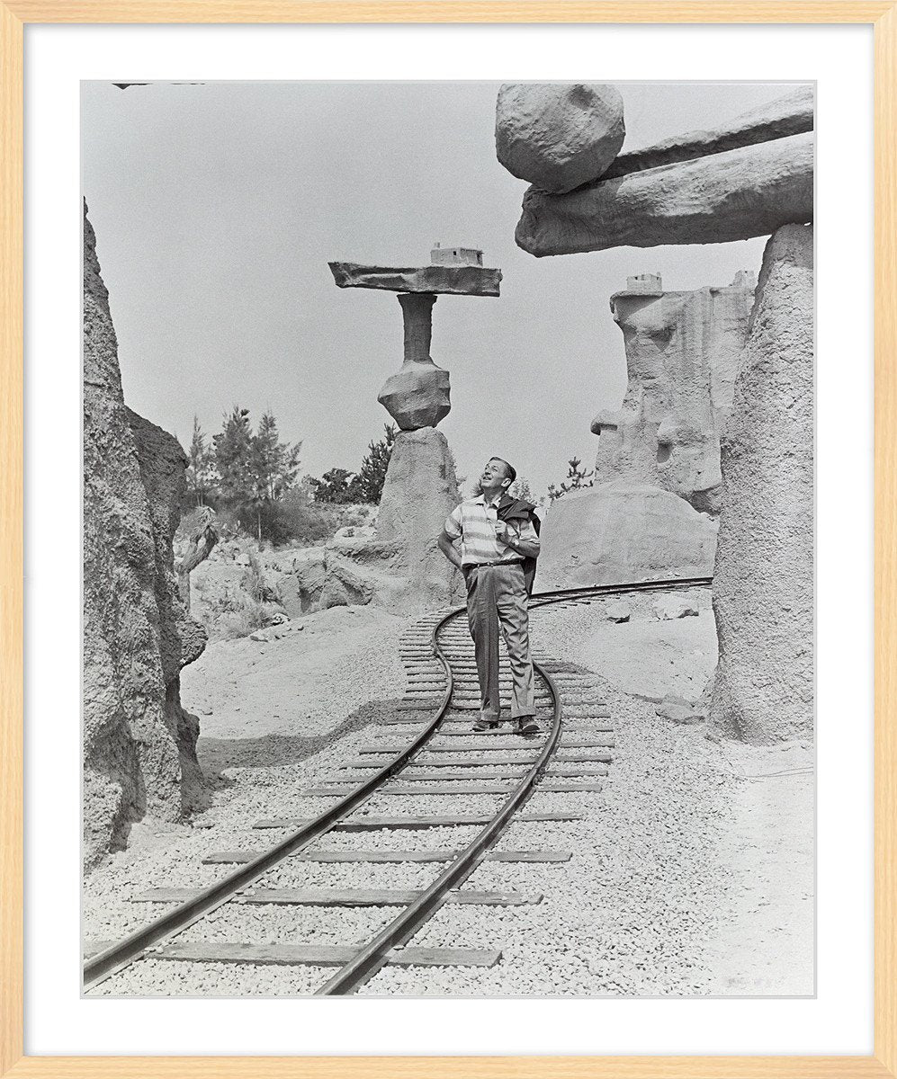 "Walt Walking on the Tracks of Rainbow Caverns Mine Train" from Disney Photo Archives - Image 10