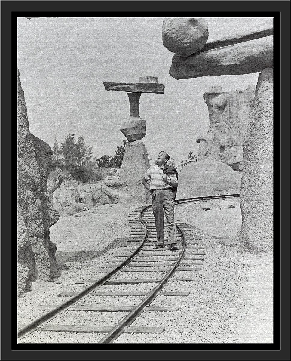 "Walt Walking on the Tracks of Rainbow Caverns Mine Train" from Disney Photo Archives - Image 14