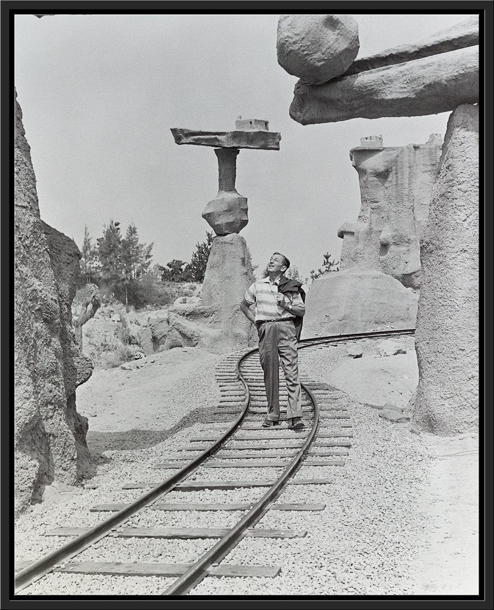"Walt Walking on the Tracks of Rainbow Caverns Mine Train" from Disney Photo Archives - Image 16