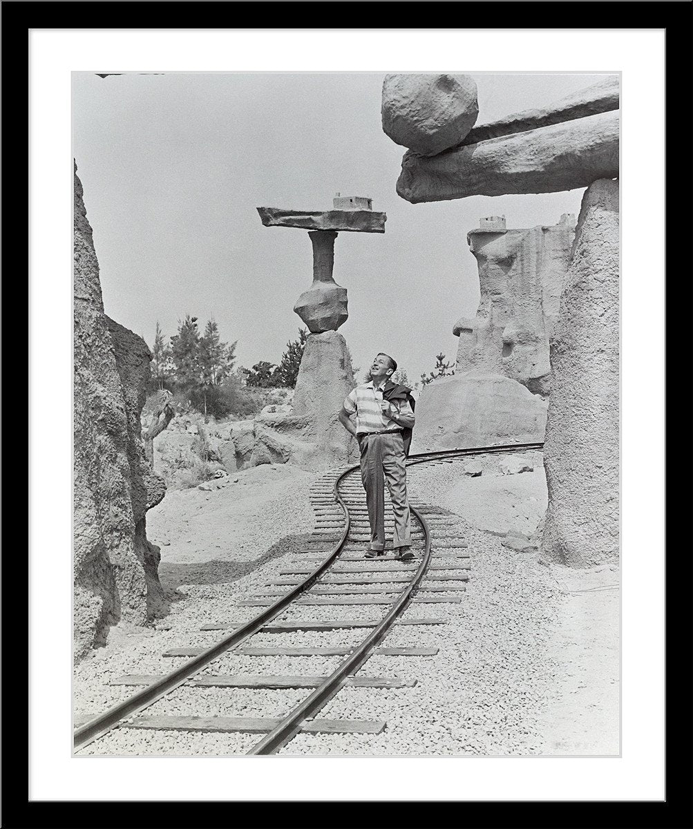 "Walt Walking on the Tracks of Rainbow Caverns Mine Train" from Disney Photo Archives - Image 7